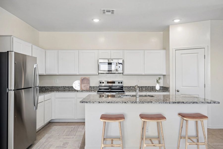Representative furnished interior of a home built from the Prism by Starlight Homes in Stonebridge Manor, Waddell (Image 10).