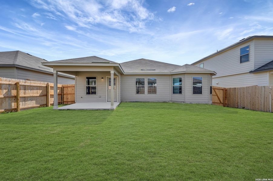 Exterior details and patio area of a home in Paloma Park, Converse (Image 28).