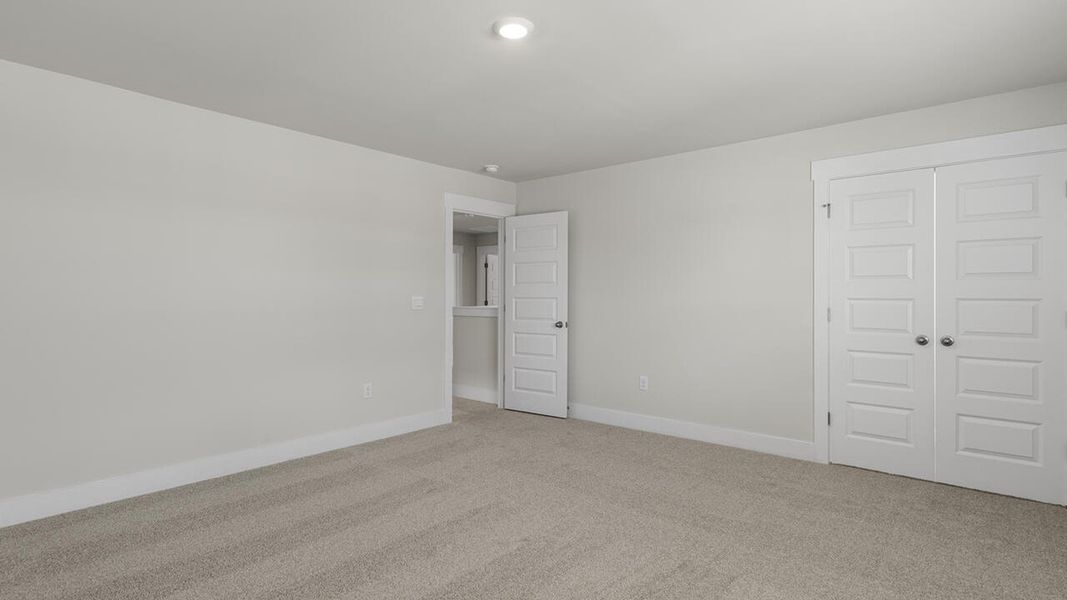 Spacious, unfurnished interior of a new home in Surfside Landing, Hubert (Image 43).