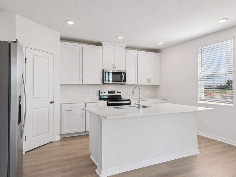 Furnished interior view inside a new home in The Reserve at Twin Lakes, St. Cloud (Image 4).
