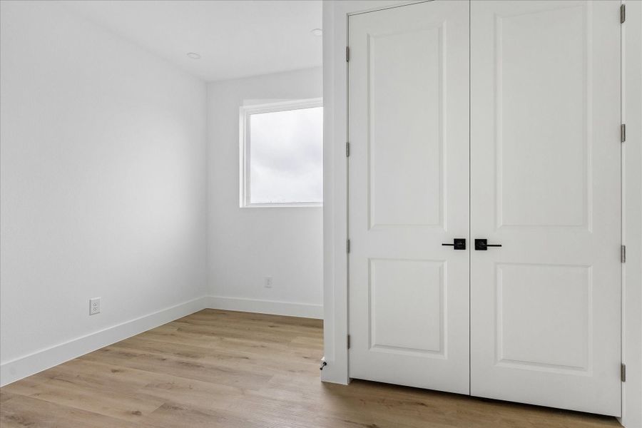 The flex space located on the third floor is perfect for an office, Peloton room, or playroom.