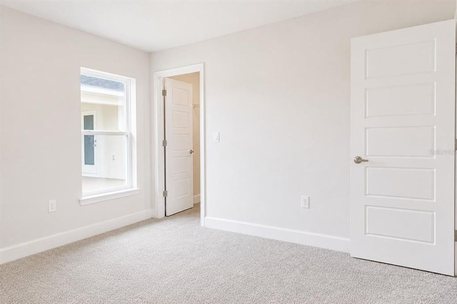 Spacious, unfurnished interior of a new home in Harmony Central, St. Cloud (Image 14).