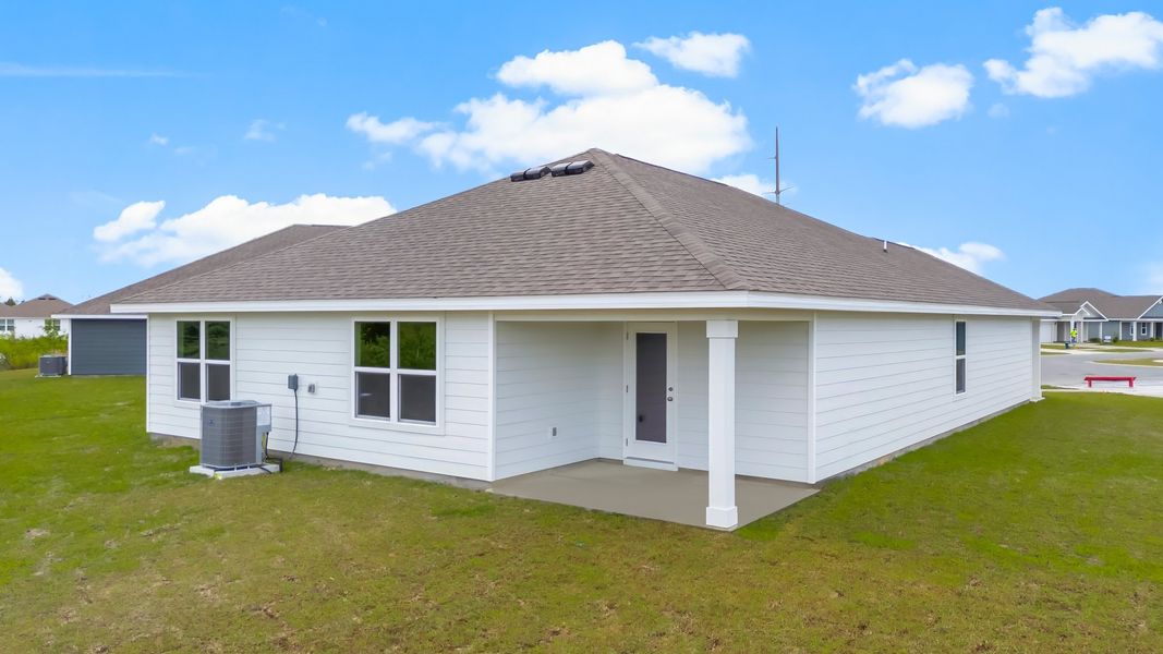 Representative exterior photo of a completed home built from the The Cali by D.R. Horton in Liberty, Panama City, FL (Image 17).