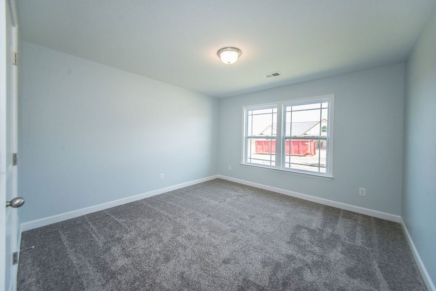 Representative unfurnished interior of a home built from the Franklin by Enchanted Homes in Guadalupe Heights, Seguin (Image 42).