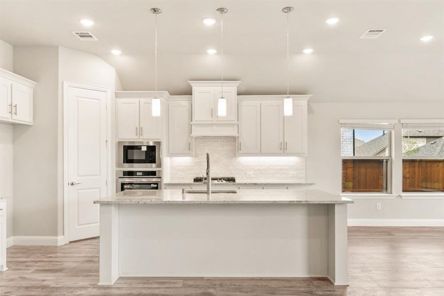 Furnished interior view inside a new home in Creekview Meadows, Pilot Point (Image 17).