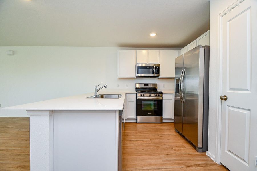 Furnished interior view inside a new home in Tavola: Cottage Collection, New Caney (Image 9).