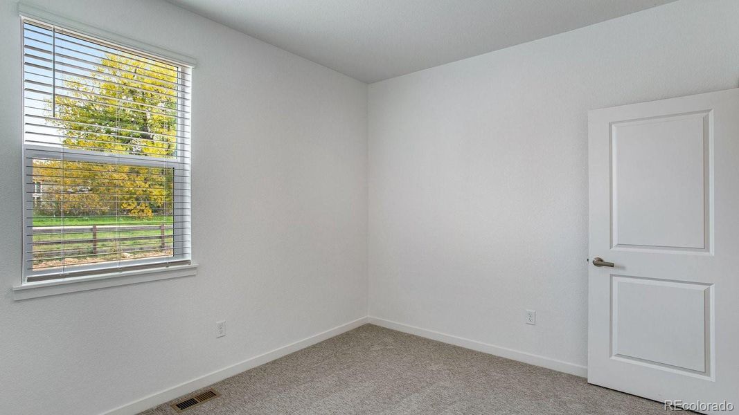 Spacious, unfurnished interior of a new home in Hansen Farm, Fort Collins (Image 29).