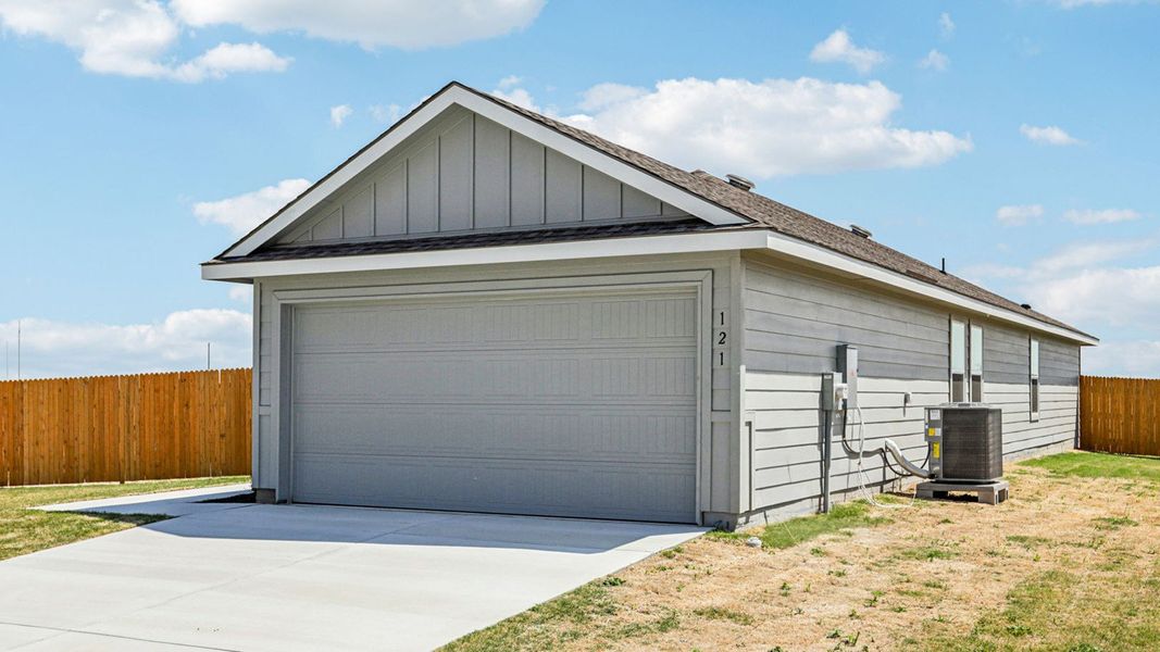Front exterior of a new home in The Villages at Schwertner Ranch, Jarrell, TX, highlighting curb appeal (Image 16).