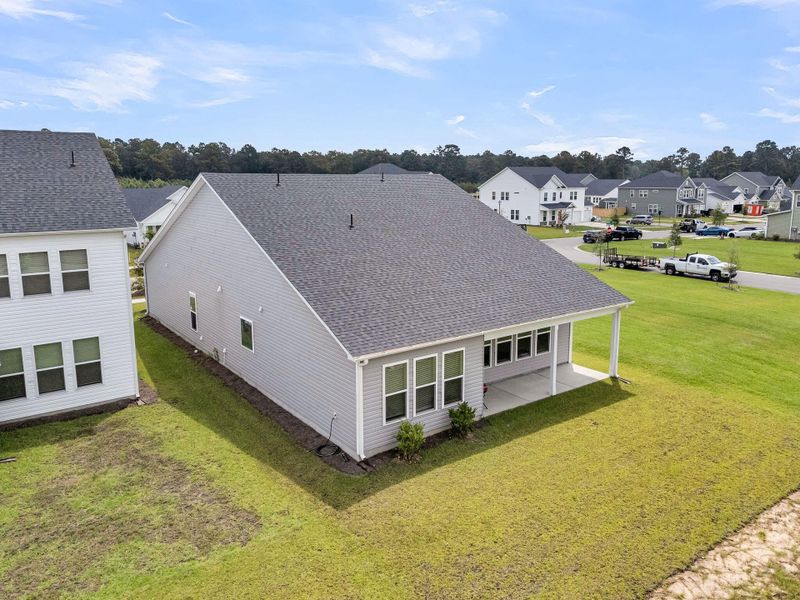 Front exterior of a new home in The Groves of Berkeley, Moncks Corner, SC, highlighting curb appeal (Image 24).