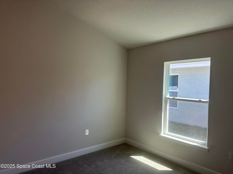 Spacious, unfurnished interior of a new home in St. John Preserve, Palm Bay (Image 10). Spacious, unfurnished interior of a new home in St. John Preserve, Palm Bay (Image 10).