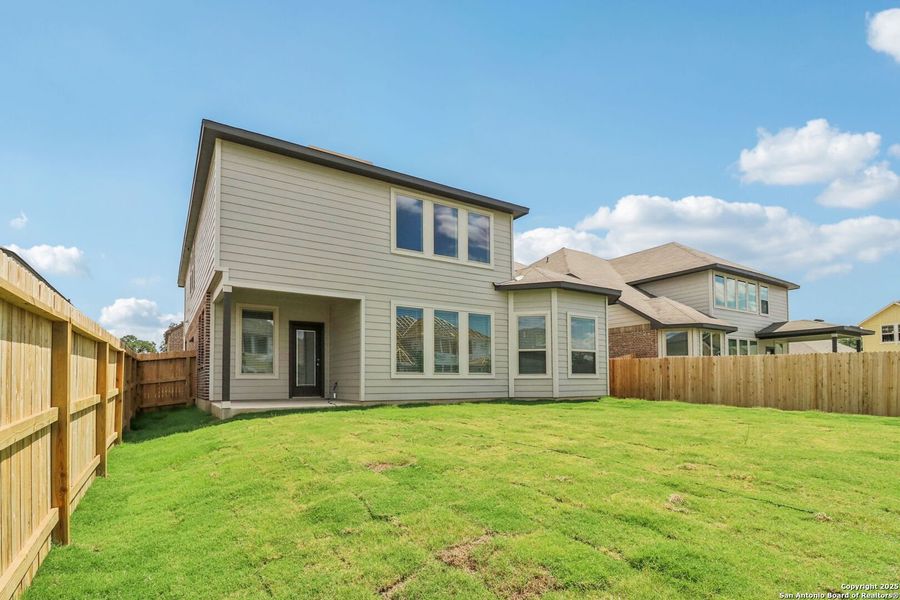Front exterior of a new home in Fox Falls, Boerne, TX, highlighting curb appeal (Image 33).