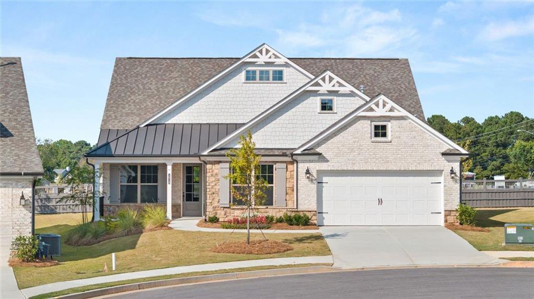 Front exterior of a new home in Soleil Summit Chase, Snellville, GA, highlighting curb appeal (Image 2).