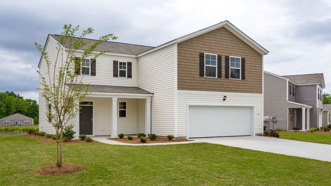 Representative exterior photo of a completed home built from the ARDEN by D.R. Horton in Island Green, Myrtle Beach, SC (Image 18).
