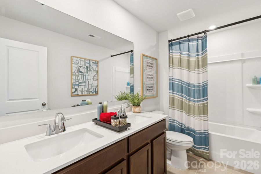 Furnished interior view inside a new home in Meadow Creek Village, Locust (Image 13).