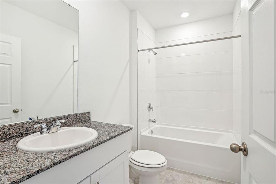 Furnished interior view inside a new home in Lake Deer Estates - Signature Series, Poinciana (Image 10). Furnished interior view inside a new home in Lake Deer Estates - Signature Series, Poinciana (Image 10).