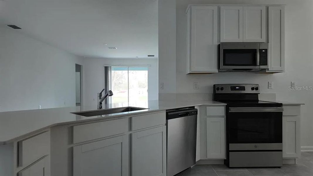 Furnished interior view inside a new home in Cascades: Grand Collection, Davenport (Image 5).