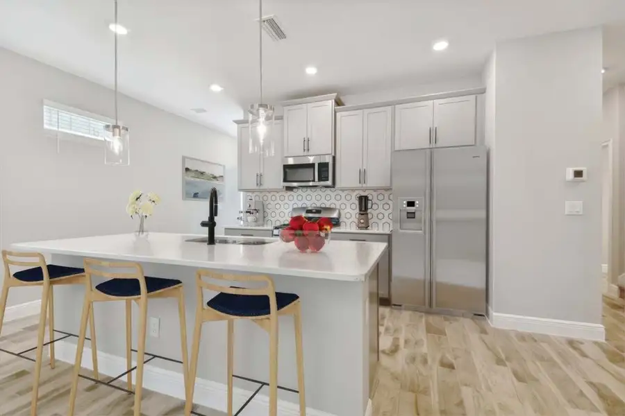 Furnished interior view inside a new home in Fairway Pointe - 55+ Villa Community, Sun City Center (Image 11).