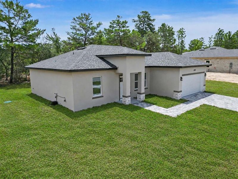 Exterior details and patio area of a home in , Citrus Springs (Image 26).