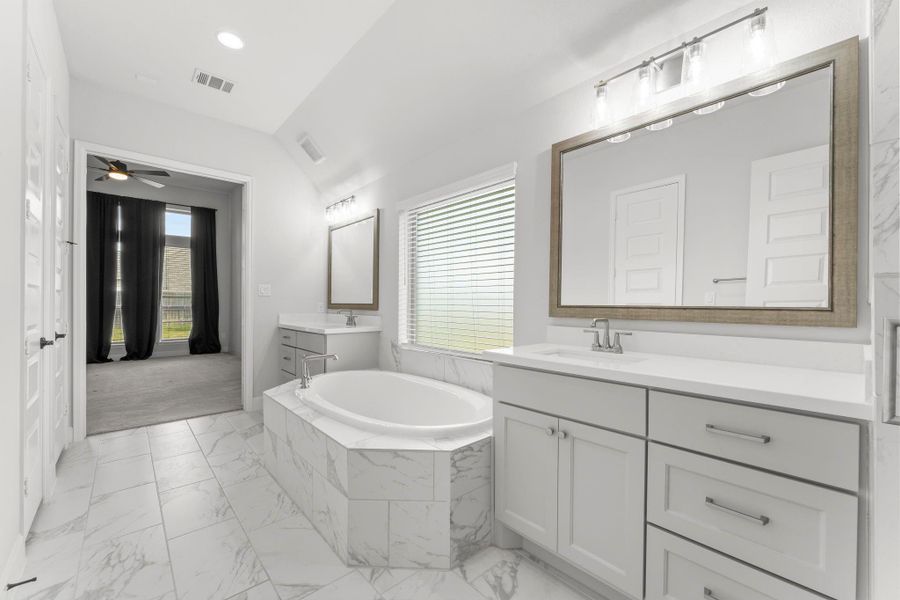 Spa vibes only! Enjoy sleek design, soft lighting, and luxury finishes including the tile flooring. Spa vibes only! Enjoy sleek design, soft lighting, and luxury finishes including the tile flooring.
