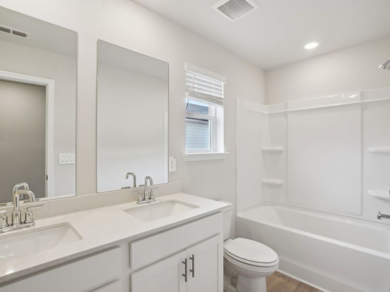 Furnished interior view inside a new home in Martin Springs - Cottage Series, Lawrenceville (Image 8).
