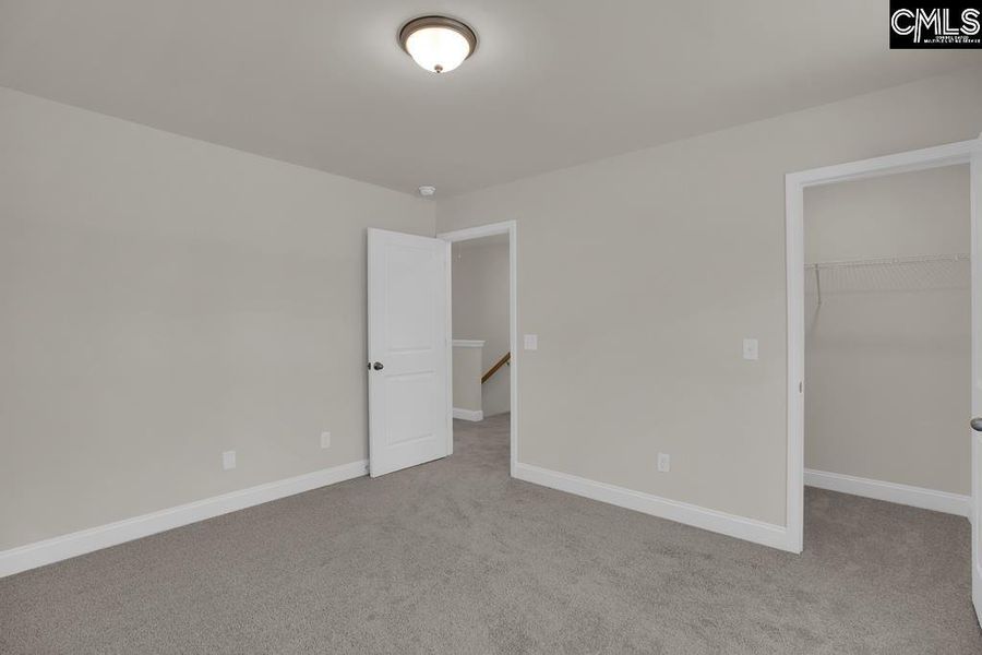 Spacious, unfurnished interior of a new home in Cottages at Roofs Pond, West Columbia (Image 32).