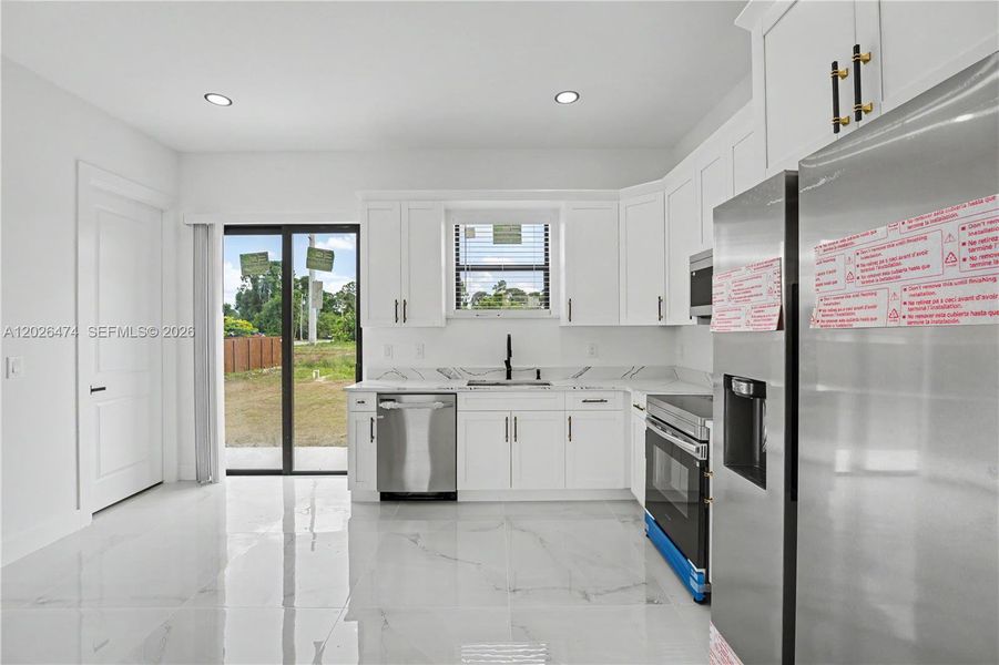 Furnished interior view inside a new home in , Lehigh Acres (Image 6).