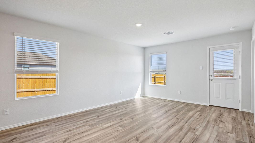 Hardwood-style flooring and bright walls create a neutral, welcoming canvas. Hardwood-style flooring and bright walls create a neutral, welcoming canvas.