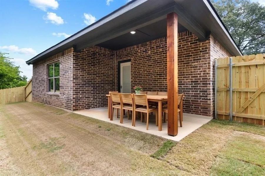 Front exterior of a new home in , Tyler, TX, highlighting curb appeal (Image 21).