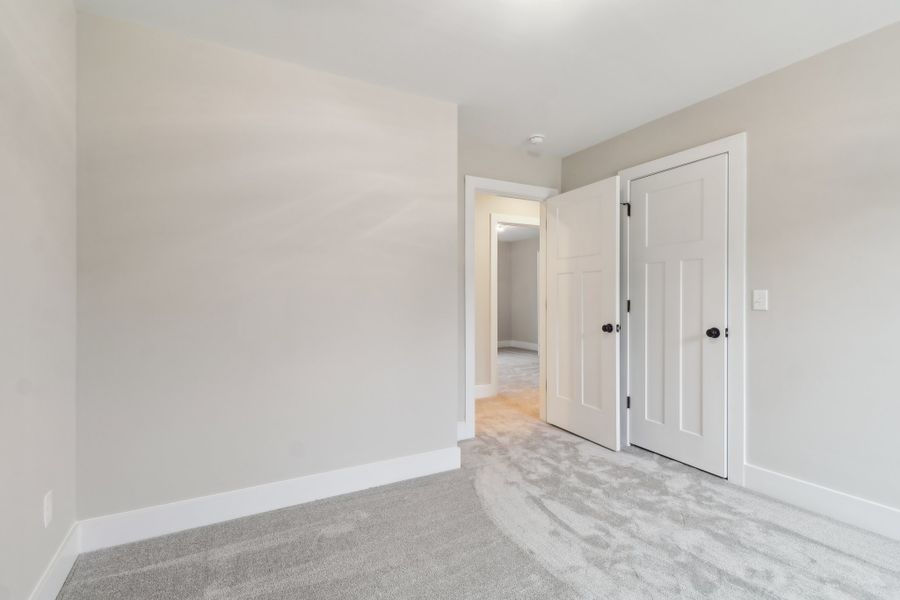 Representative unfurnished interior of a home built from the Ashbourne II by Great Southern Homes in Collins Cove, Chapin (Image 43).