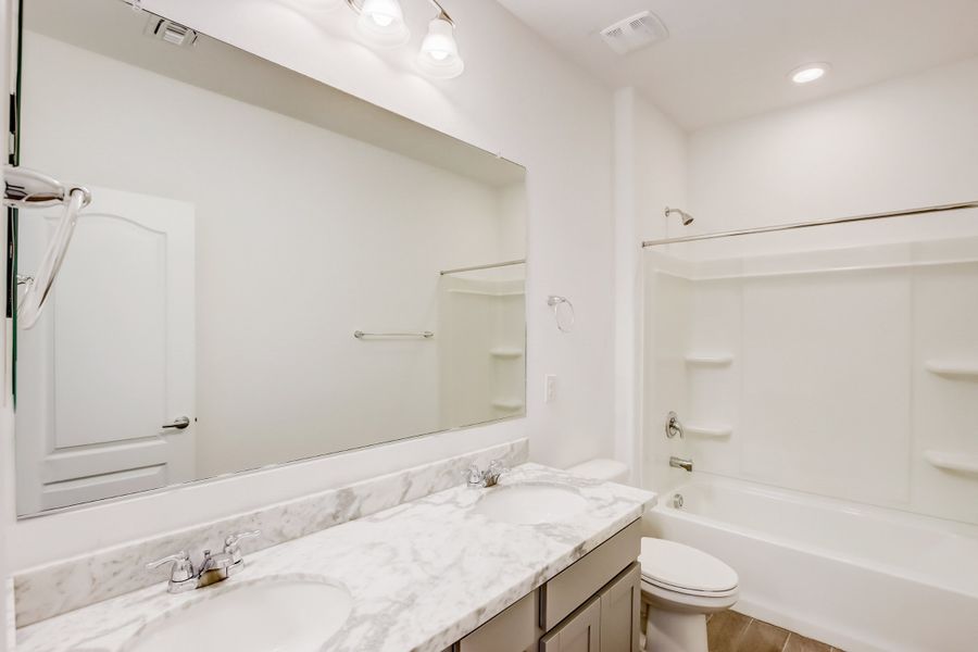 Representative furnished interior of a home built from the Larkspur by DRB Homes in The Villas at Mystic, Peoria (Image 6).