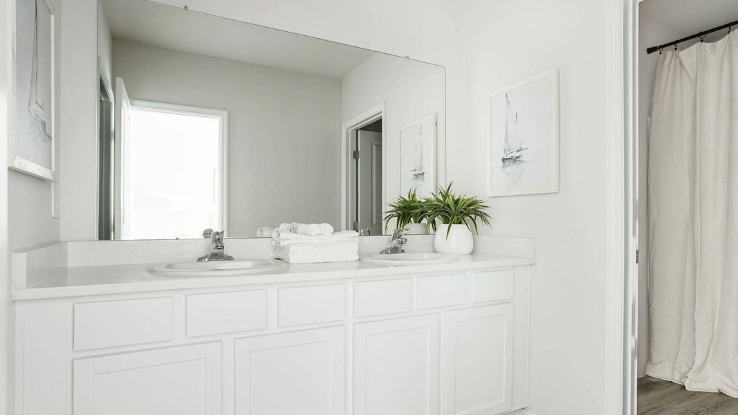 Furnished interior view inside a new home in Oasis at Longwood Run, Sarasota (Image 13).