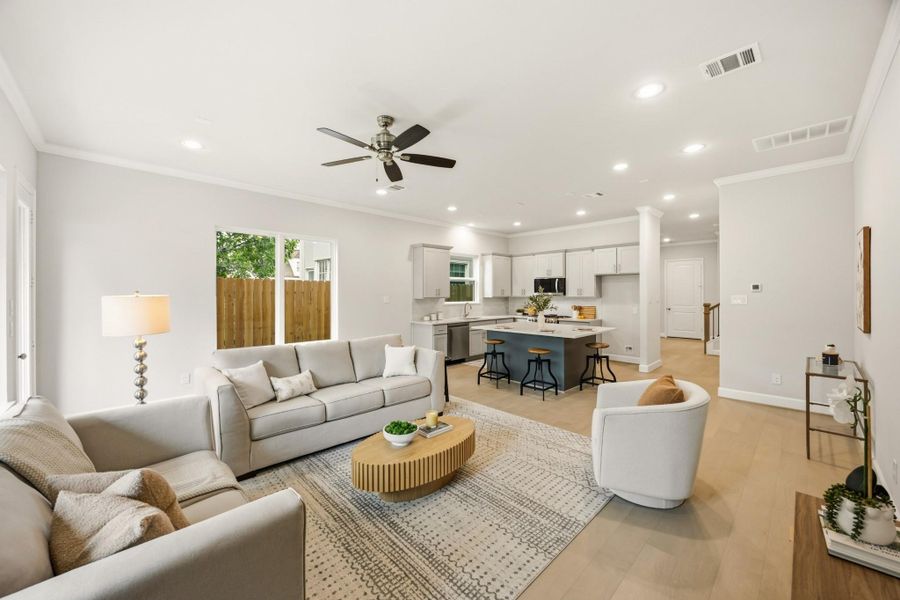 The kitchen's open design seamlessly transitions into the spacious living room, affirming the beauty of an interconnected living space. The kitchen's open design seamlessly transitions into the spacious living room, affirming the beauty of an interconnected living space.