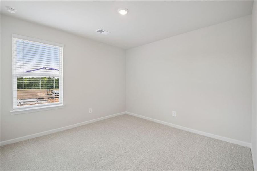 Spacious, unfurnished interior of a new home in Northwoods at Mirror Lake, Villa Rica (Image 41).