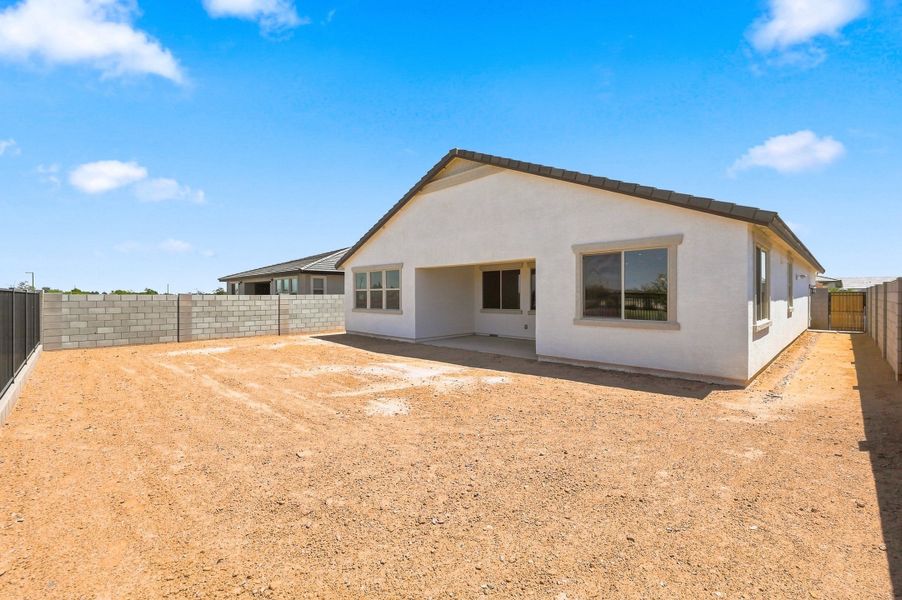 Exterior details and patio area of a home in Marbella at Windrose, Waddell (Image 3).
