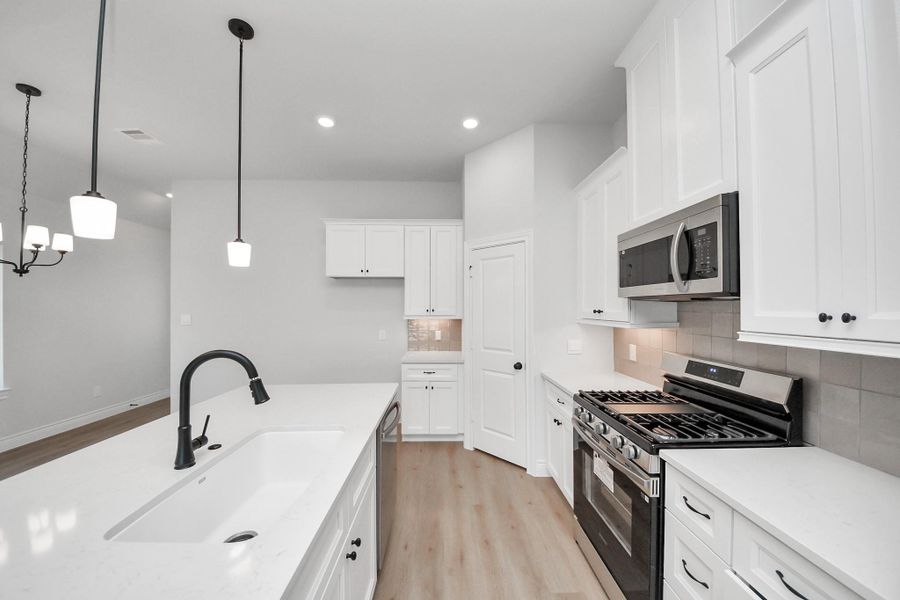 Furnished interior view inside a new home in Lexington Heights, Willis (Image 11). Furnished interior view inside a new home in Lexington Heights, Willis (Image 11).