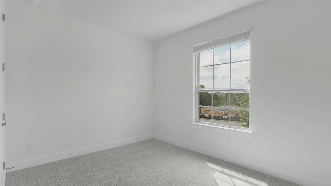 Representative unfurnished interior of a home built from the Mariah by Chesmar Homes in Crescent Bluff, Georgetown (Image 12).