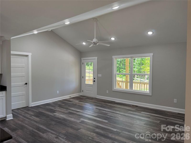 Living room with vaulted ceilings