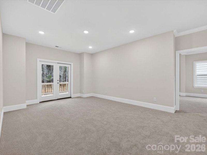 Spacious, unfurnished interior of a new home in North Creek Village, Huntersville (Image 28).