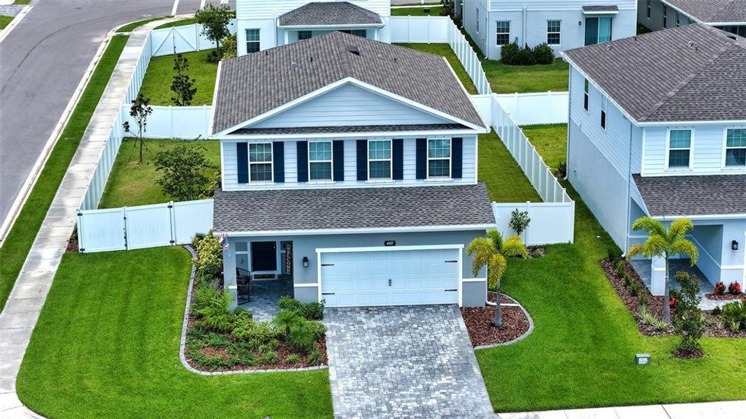 Front exterior of a new home in , Bradenton, FL, highlighting curb appeal (Image 24).