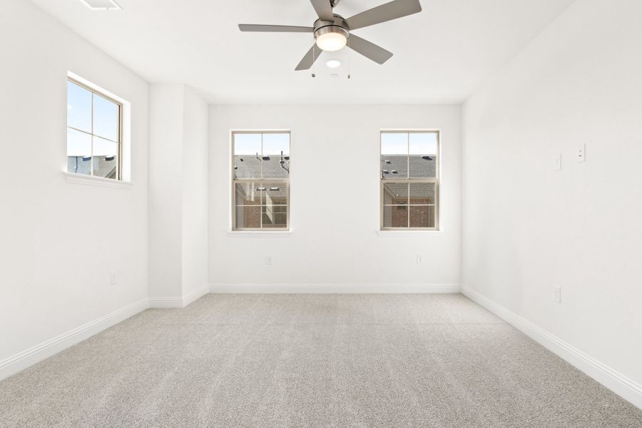 Spacious, unfurnished interior of a new home in The Tribute, The Colony (Image 32).