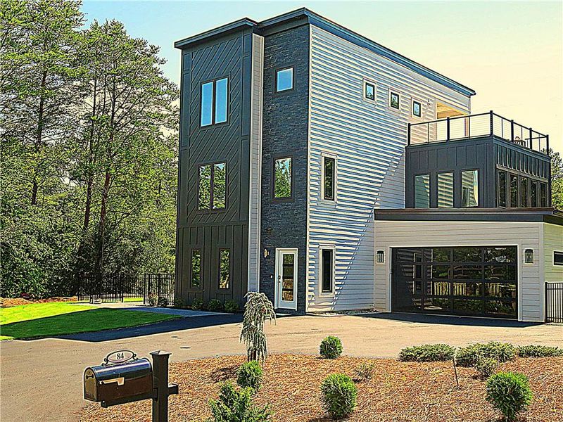 Front exterior of a new home in , Helen, GA, highlighting curb appeal (Image 1). Front exterior of a new home in , Helen, GA, highlighting curb appeal (Image 1).