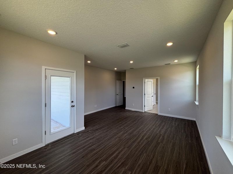 Spacious, unfurnished interior of a new home in The Cypress Series at Reserve East, Flagler Beach (Image 24).