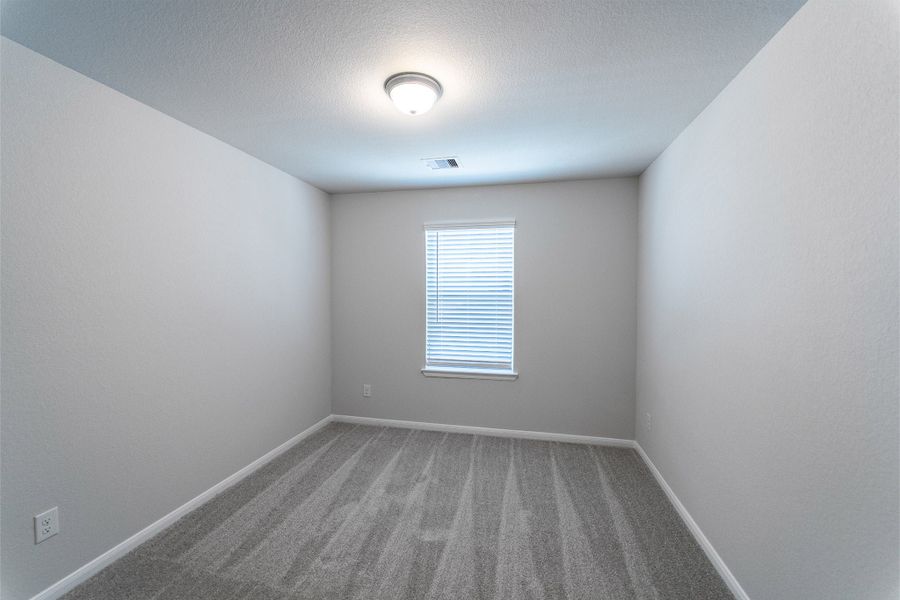 Spacious, unfurnished interior of a new home in Canterra Creek, Rosharon (Image 18).