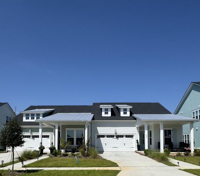 Front exterior of a new home in Carnes Crossroads, Summerville, SC, highlighting curb appeal (Image 1). Front exterior of a new home in Carnes Crossroads, Summerville, SC, highlighting curb appeal (Image 1).