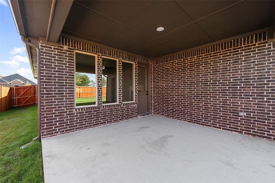 Exterior details and patio area of a home in Morningstar, Aledo (Image 24).