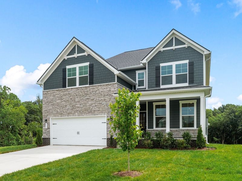 Front exterior of a new home in Calista Farms, White House, TN, highlighting curb appeal (Image 2). Front exterior of a new home in Calista Farms, White House, TN, highlighting curb appeal (Image 2).