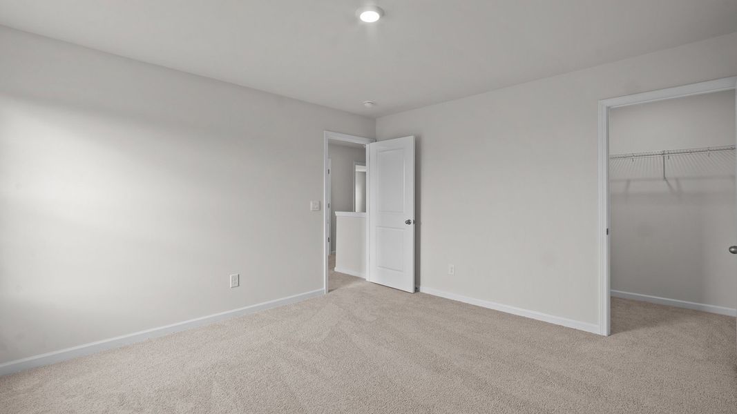 Spacious, unfurnished interior of a new home in Ridgewood Farms, Winterville (Image 20).