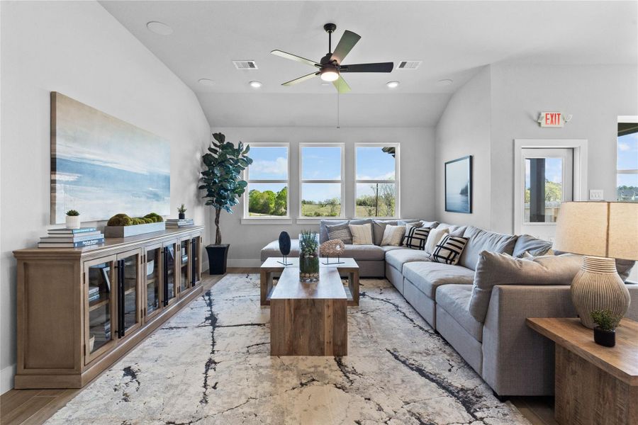 This modern kitchen island features a polished granite countertop with an undermount stainless steel sink, complemented by a Moen Sleek chrome faucet with DuPure water filtration system. This modern kitchen island features a polished granite countertop with an undermount stainless steel sink, complemented by a Moen Sleek chrome faucet with DuPure water filtration system.
