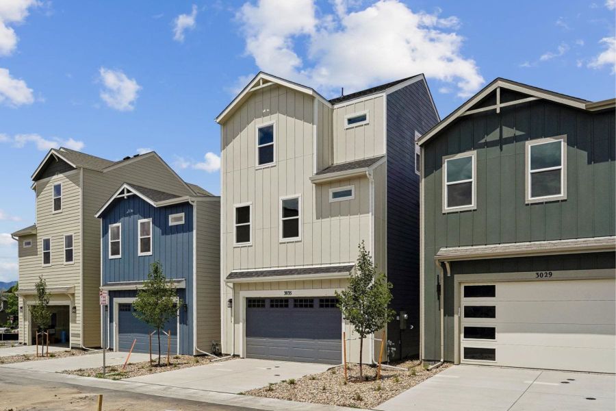 Front exterior of a new home in Pony Park, Colorado Springs, CO, highlighting curb appeal (Image 19). Front exterior of a new home in Pony Park, Colorado Springs, CO, highlighting curb appeal (Image 19).