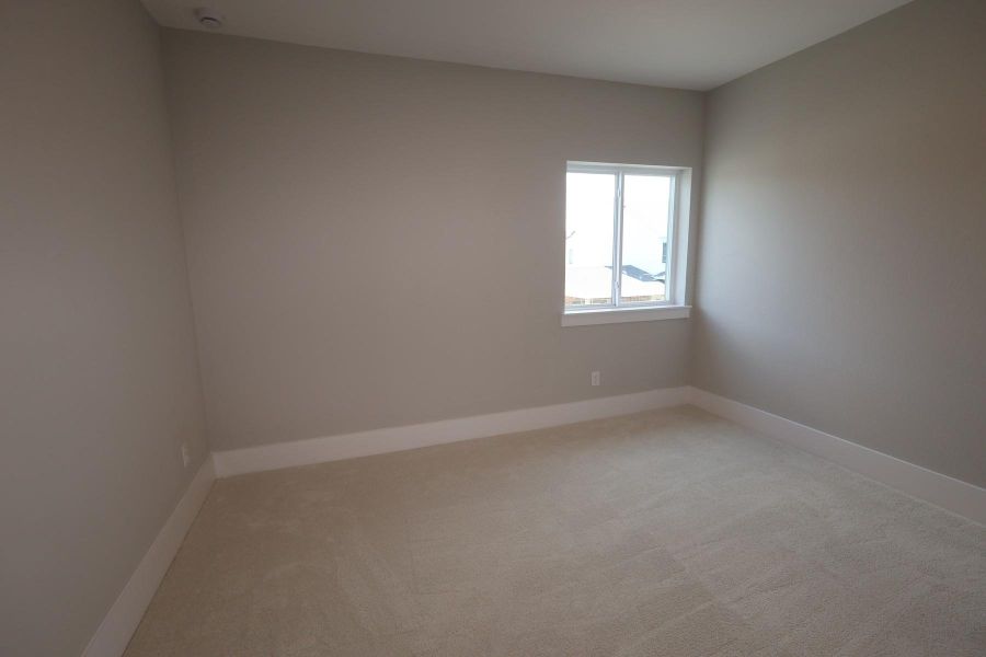 Spacious, unfurnished interior of a new home in Easthaven at Bridgeland Central - Horizon Collection, Cypress (Image 10).